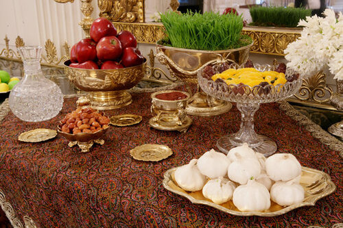 A table of "haft seen" i.e. "seven good things", traditionally made for Persian New Year. 