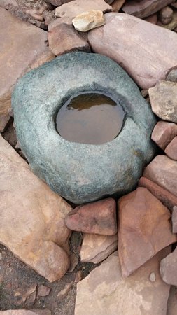 One of many quern stones found at the Clachtoll broch archaeological site, Assynt, Sutherland, west coast of Scotland.