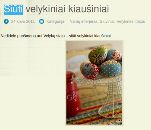 A stand with four or more brightly patterned fabric-covered "eggs".  Cropped from a website giving instructions about how "to sew Easter eggs"; the heading, in Lithuanian, is "Siūti velykiniai kiaušiniai". "Siūti" means "to sew".
